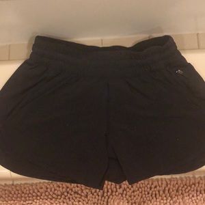 Sped up high rise Lululemon shorts.